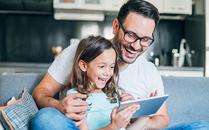 A father provides remote rehabilitation to his daughter.