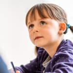 Speech therapy and rehabilitation support is important for children using bone conduction devices.