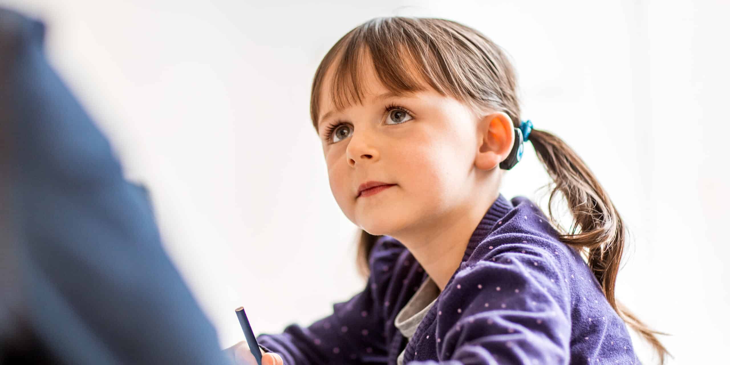 Speech therapy and rehabilitation support is important for children using bone conduction devices.