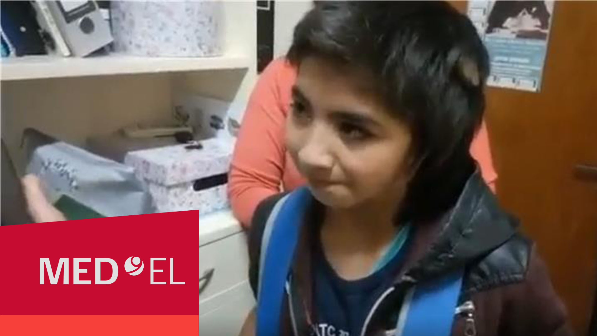Maxi, a little boy from Argentina, smiles as he describes his everyday life with a BONEBRIDGE implant and SAMBA 2 audio processor.