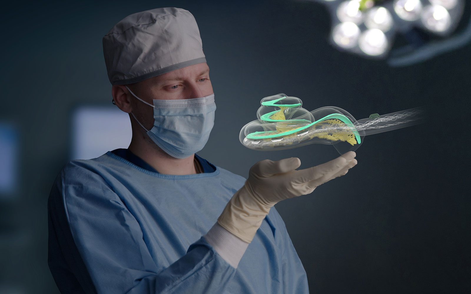 A CI surgeon holds a visualization of a cochlea with the electrode array being inserted.