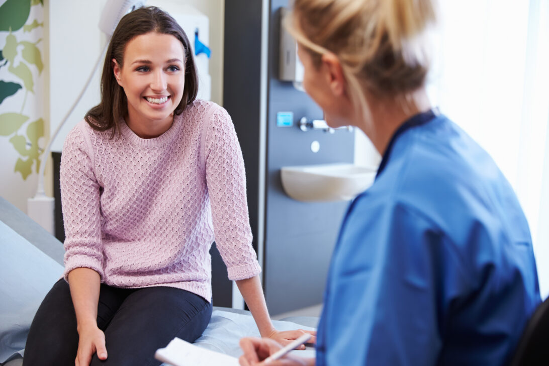 woman discussing CI with doctor