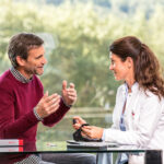 Clinician speaking with patient