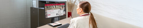 clinician looking at a screen